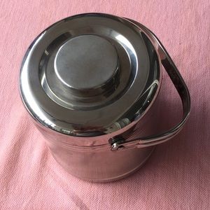 Stainless steel three dish covered container.
